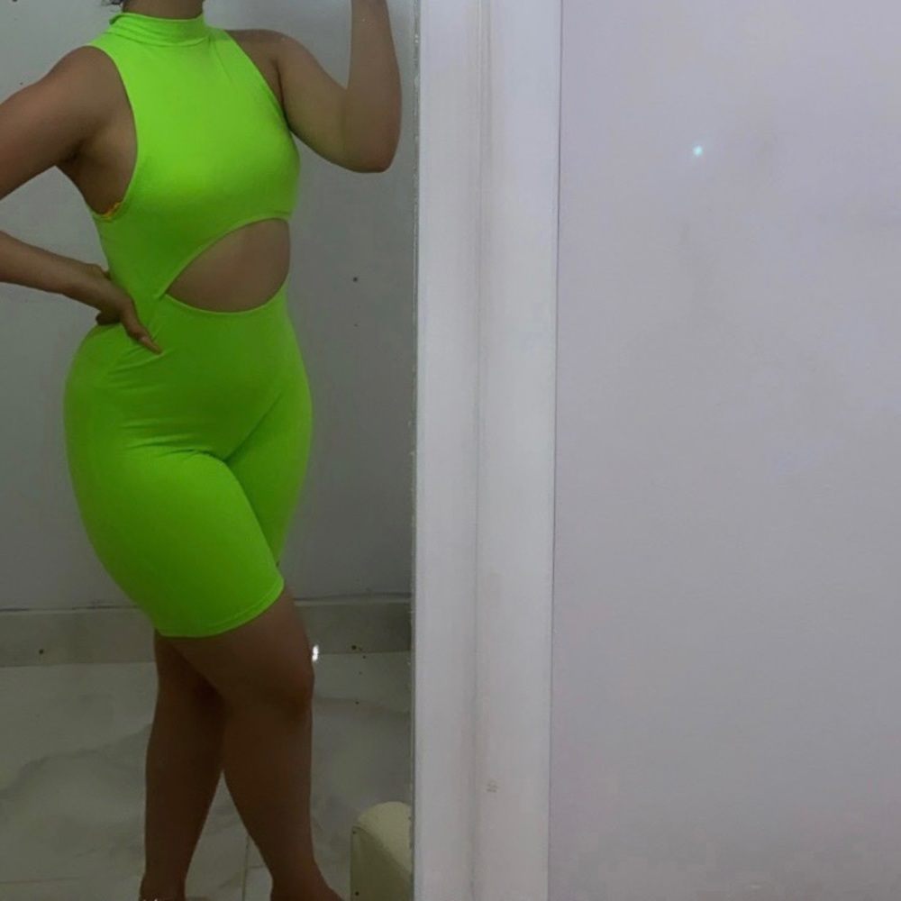 Selling this neon green body suit!